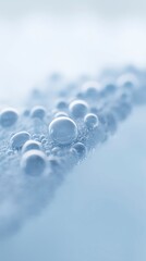 Poster - Close-up of water droplets on a smooth surface, creating a serene and calming atmosphere, showcasing the beauty of nature's elements and their interaction with light