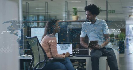 Poster - Woman pointing tablet and colleague leaning over desk, with data overlays enhancing map analysis