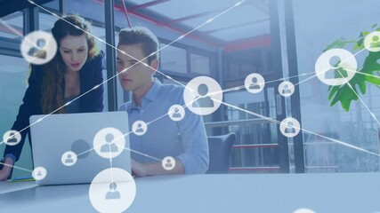 Poster - Colleagues leaning over laptop scrolling while user-icon appearing connecting network in technology
