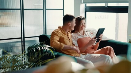 Poster - Couple, relax and scroll with tablet on sofa for online shopping, app choice or purchase decision. Happy, people or bonding together with digital tech in home for social browsing or streaming service