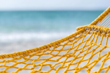 Poster - relax hammock beach concept. A vibrant yellow hammock against a serene beach background.