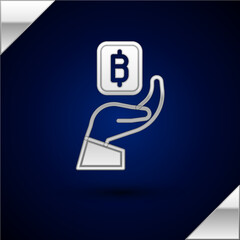 Poster - Silver Hand holding Bitcoin icon isolated on dark blue background. Blockchain technology, digital money market, cryptocoin wallet. Vector