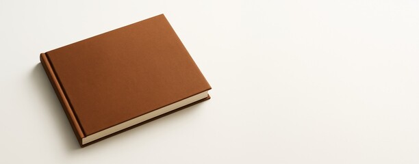 Poster - Closed brown hardcover book lying on light background with copyspace for design or advertising concept. Clean minimal mockup template style.