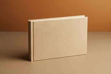 Poster - Beige horizontal hardcover book standing on brown surface with matching background, minimal clean design concept for branding or mockup purposes.