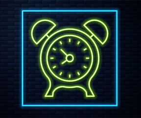 Fototapete - Glowing neon line Alarm clock icon isolated on brick wall background. Wake up, get up concept. Time sign. Vector