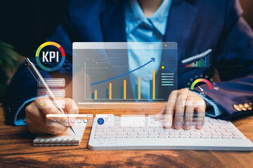 Poster - Data analyzing concept. Business professional analyzing key performance indicators with graphs and digital tools in modern office setting