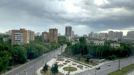 Wall Mural - storm clouds, strong wind and heavy rain in the background (4k, timelapse)