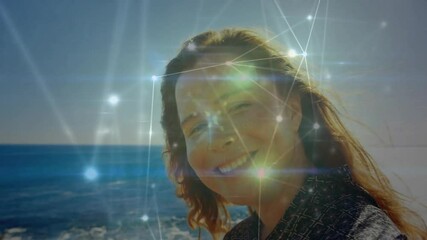 Poster - Woman lowering gaze and closing eyes on shoreline while tech overlay reacting to sunlight
