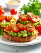 © hardvicore - Toasted bread with mashed avocado, sliced cherry tomatoes. Tasty snack.