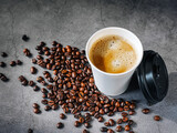 Coffee espresso wite smoke in paper Coffee cup and bean , Fragrant Espresso in  Takeaway paper coffee cup