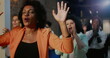 © Marco - Diverse group of people praying passionately during spiritual worship gathering in a modern church, expressing faith and devotion in a heartfelt atmosphere
