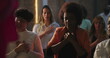© Marco - Diverse group of Christian worshippers in prayer, hands on hearts, eyes closed, deep spiritual connection in evangelical congregation