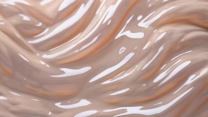 Poster - Beige viscous cosmetic product is gently flowing and reflecting light, creating smooth waves and a luxurious texture, suitable for beauty, skincare, and makeup-related videos