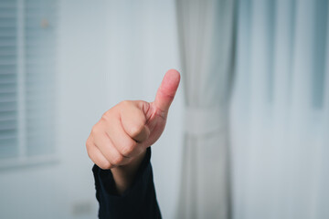 Aufkleber - Business hand gesture success signal modern workspace indoor office environment close-up view