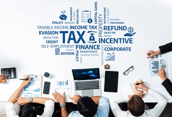 Aufkleber - A diverse team of professionals engaged in a discussion about tax strategies, using financial charts and data to explore income tax, incentives, and corporate finance arrangements. Amity