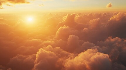 Poster - Golden sunset above fluffy cloudscape viewed from above.