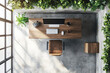 © Vectors stock  - Overhead view of modern office workspace featuring wooden desk with plants and concrete elements
