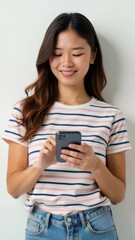 Poster - A happy woman looks at her phone, possibly reading messages or scrolling through social media