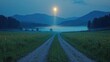 © RizalAziz - Foggy Landscape View Featuring Moonlight on Pathway Leading to Distant Mountains