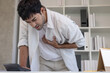 © Shisu_ka - hand hold chest with heart attack symptoms, asian man have chest pain caused by heart disease, leak, dilatation, enlarged coronary heart, press on the chest with a painful expression