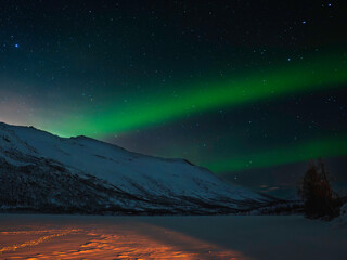aurora borealis over the mountains