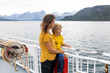 © Tomsickova - Child, cute boy, looking at the mountains from a ferry in Nortern Norway