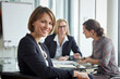 © Westend61 - Businesswoman smiling during a meeting in an office setting