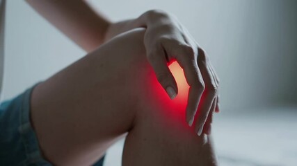 Poster - Close up of woman's leg, highlighted red area indicates location of knee pain, suggesting possible injury or medical condition requiring attention