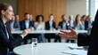 © Natti - A diverse group of smiling businesspeople are working together in an office conference meeting