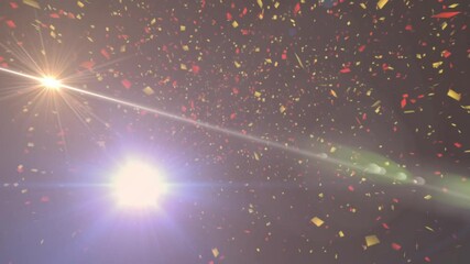 Poster - Red-yellow confetti appearing and drifting under crossing light beams creating starburst flares
