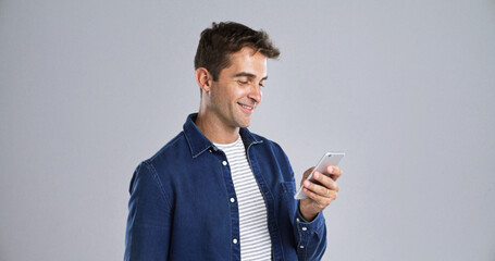 Leinwandbilder - Man, smartphone and check notification for communication, social media or email for connection. Mockup space, mobile app and male person with reading message, texting or blog on white background
