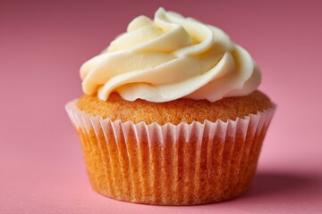 Poster - Cupcake with creamy frosting on a pink background perfect for dessert lovers and celebrations