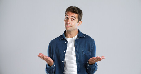 Poster - Man, hands and space in studio for choice, portrait and option with mock up by background. Person, model and open palm for decision, review and question for retail customer experience in Portugal