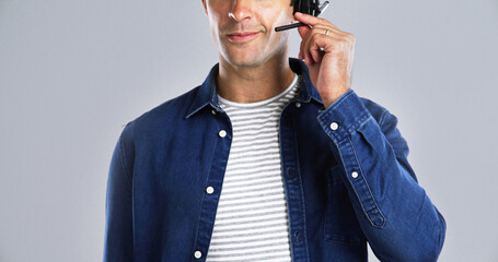 Fototapete - Mic, mouth and man with call center in studio for communication agent, contact us and CRM. Hand, help desk or inbound with customer service, consultant and headset for advice on white background