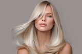 Blonde woman with straight flowing hair and medium length hairstyle