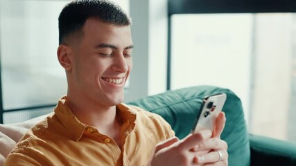 Aufkleber - Happy, sofa and man with phone laughing for social media, funny message and chatting. Living room, home and person on smartphone for communication, internet humor and online meme on mobile app