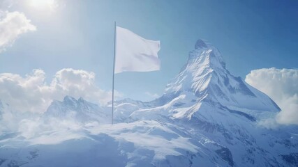 Wall Mural - White flag on snowy mountain peak by clear blue sky, symbol of peace