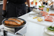 © offsuperphoto - chef cooking salmon steaks in the kitchen