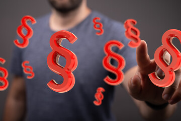 Poster - Abstract image of a man interacting with floating paragraph symbols, representing legal concepts, law, and regulations.