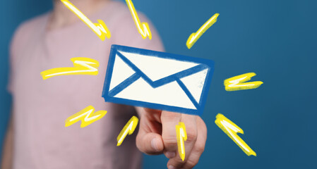 Leinwandbilder - Hand points to email icon, fast, efficient messaging, online communication.