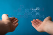 © vegefox.com - Image of connected email icons above open hands, representing global communication and networking.