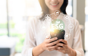 Aufkleber - Women analyze ESG icons smartphone for sustainable corporate business investment strategy. Organization focus environment social governance development goals path to achieve positive business change