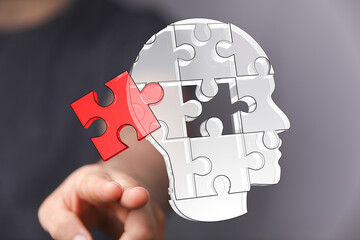 Poster - Unlocking potential through cognitive understanding. Puzzle pieces represent mental processes.