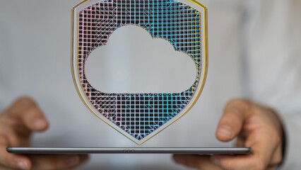 Aufkleber - Safeguard your cloud data.  Image depicts a protective shield icon over a cloud symbol on a tablet.