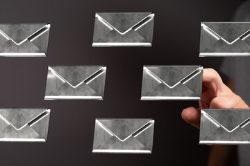 Leinwandbilder - Hand selecting an email from a digital inbox.  Concept of communication, online messaging.