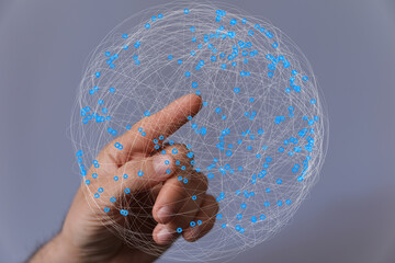 Aufkleber - Abstract image of a hand interacting with a digital sphere representing global network connections.