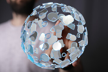 Aufkleber - Abstract image of a person interacting with a sphere of communication icons, representing global connectivity and communication.