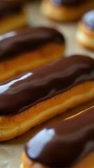 Poster - A tray of chocolate-covered doughnuts sitting on a table, perfect for a party or office gathering
