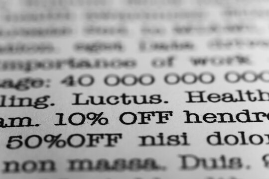 10 percent off. Text printed on a page. A piece of paper with a phrase. Marketing.