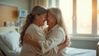 © miss irine - Two smiling women hug gently in a hospital room. One with long blond hair, other with grey hair. They smile with joy and tenderness. Friendship, care, love, support and comfort in the hospital.